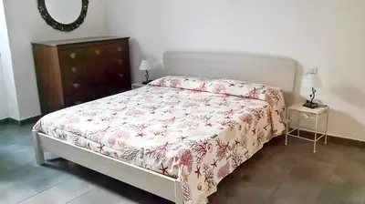 Letto o letti in una camera di Casa Vacanze da Anna e Turi
