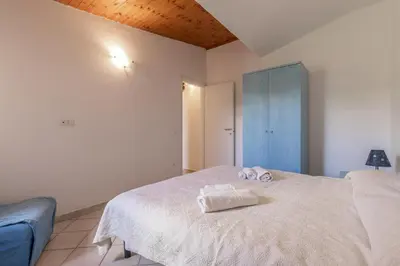 Letto o letti in una camera di Baia Turchese Olbia