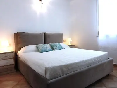 Letto o letti in una camera di DreamHouse Miramare