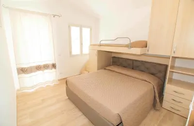 Letto o letti in una camera di Villa Sant'anna