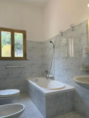 Bagno di Affittacamere Belvedere - Posada