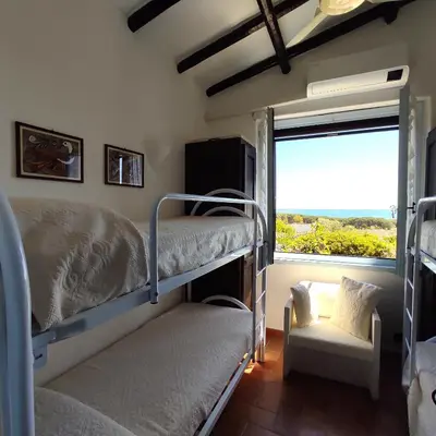 Letto o letti in una camera di Villetta Oasi Belvedere, Budoni, Wifi, Ac