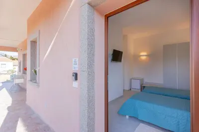 Letto o letti in una camera di Domo Davide