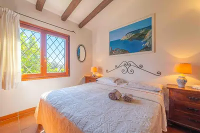 Letto o letti in una camera di Fiokky by DomusAway