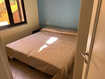 Letto o letti in una camera di Casa Arborea