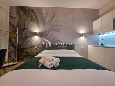 Letto o letti in una camera di DEALCASA Guest House