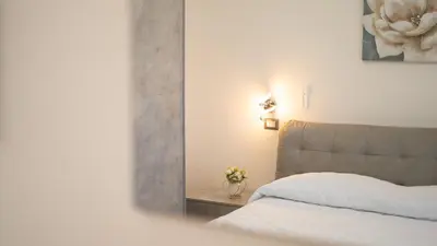 Letto o letti in una camera di Capo Comino 3