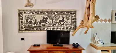 TV o dispositivi per l'intrattenimento presso S Abba e Sa Pedra Sea Home