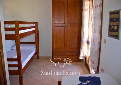 Letto o letti in una camera di Villetta Ponza - Relax e Comfort a San Teodoro