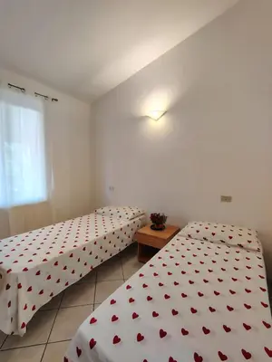 Letto o letti in una camera di Il Nido 2 di San Pietro