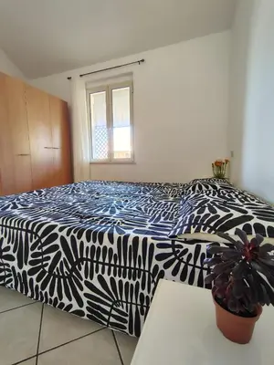 Letto o letti in una camera di Il Nido 2 di San Pietro