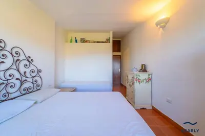 Letto o letti in una camera di Residenza Di Paola e Francesco - By Searly