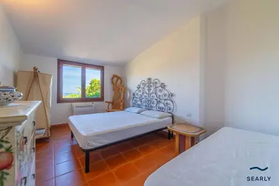 Letto o letti in una camera di Residenza Di Paola e Francesco - By Searly