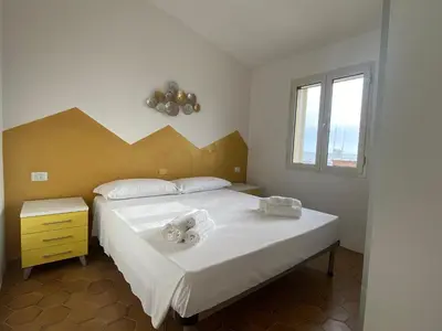 Letto o letti in una camera di La casa dei pescatori