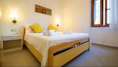 Letto o letti in una camera di Emil's Vacation Home La Caletta