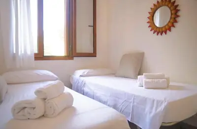 Letto o letti in una camera di Emil's Vacation Home La Caletta