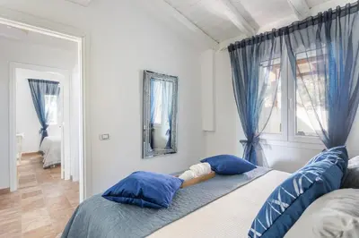 Letto o letti in una camera di Villa Il Sogno A dream with open eyes, seafront