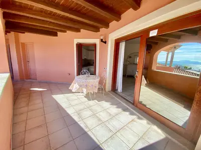 Letto o letti in una camera di Luxury apartment Ginepro sea view with common swimming pool just 50 mt from the beach