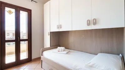 Letto o letti in una camera di La casa di Leo e Lucy