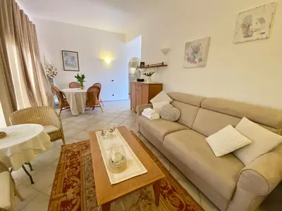 Area soggiorno di Luxury apartment Elicriso sea view with common swimming pool just 100 mt from the beach