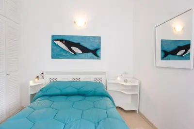 Letto o letti in una camera di Rosa