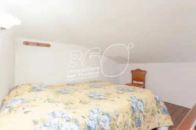 Letto o letti in una camera di Trilo Harbour