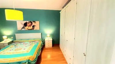 Letto o letti in una camera di Via Genova Apartment