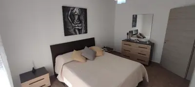 Letto o letti in una camera di Casa Elicriso