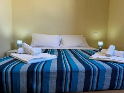 Letto o letti in una camera di Tavolara View in Santa Lucia