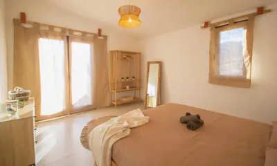 Letto o letti in una camera di Rena & Agua Apartments