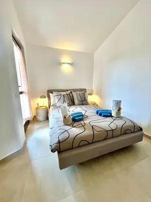 Letto o letti in una camera di Casa Valù