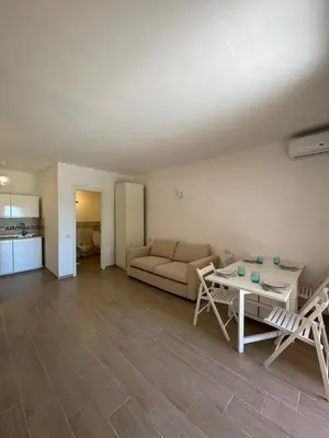 Area soggiorno di Porto San Paolo Mono apartment