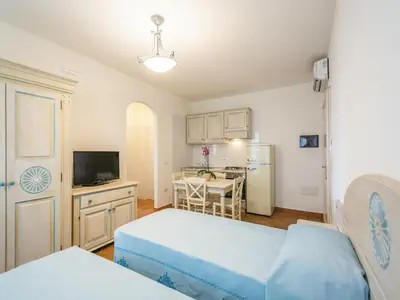 Letto o letti in una camera di Apartment in Orosei near Marina di Orosei Beach