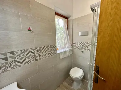 Bagno di Appartamento a 650 mt dal mare - San Teodoro