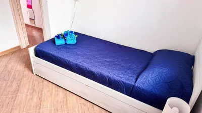 Letto o letti in una camera di La casa delle Stelle by Ca-Sa Check