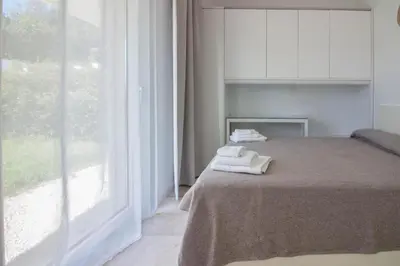 Letto o letti in una camera di GuestHost - Stunning Apartment in Pittulongu with Pool