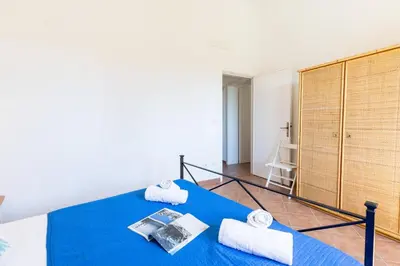 Letto o letti in una camera di Panoramic Terrace Over Tavolara - Relax and Sea View