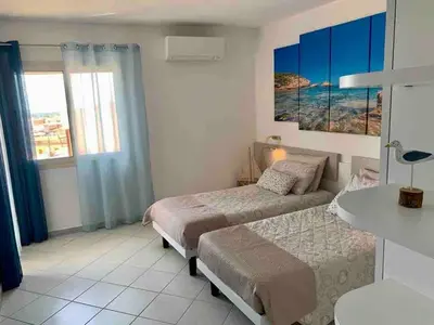 Letto o letti in una camera di Modern Seaview Townhouse - Workcation friendly