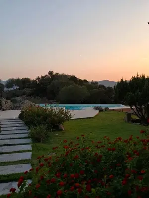 Piscina di Villa Capo Coda Cavallo Baia Salinedda o nelle vicinanze