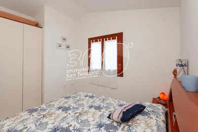Letto o letti in una camera di Lu Mattoni