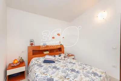 Letto o letti in una camera di Lu Mattoni