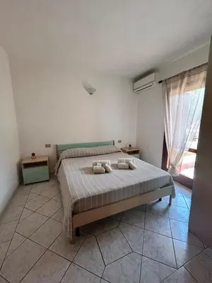 Letto o letti in una camera di Casa BeaB