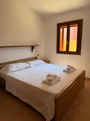Letto o letti in una camera di La Domus di Jacqueline