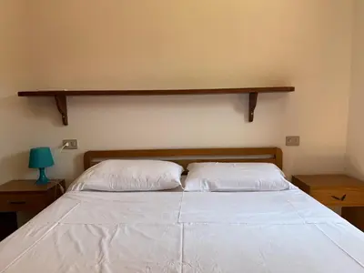 Letto o letti in una camera di La Domus di Jacqueline