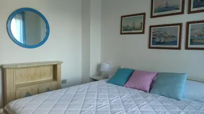 Letto o letti in una camera di Casa Maggy
