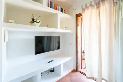 TV o dispositivi per l'intrattenimento presso Green Residence Bados Mare