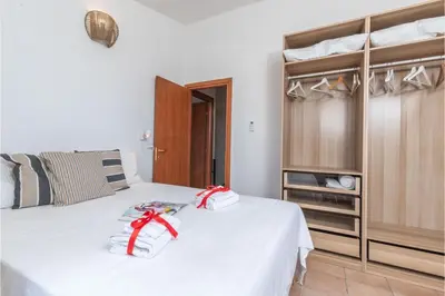 Letto o letti in una camera di House Sardinia La Dolce Vita - Happy Rentals