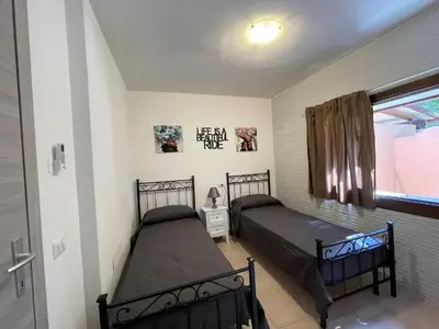 Letto o letti in una camera di domo prama 2