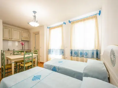 Letto o letti in una camera di Apartment in Orosei near Marina di Orosei Beach