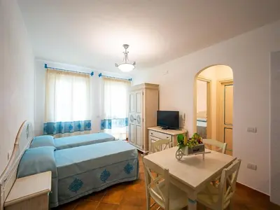 Letto o letti in una camera di Apartment in Orosei near Marina di Orosei Beach